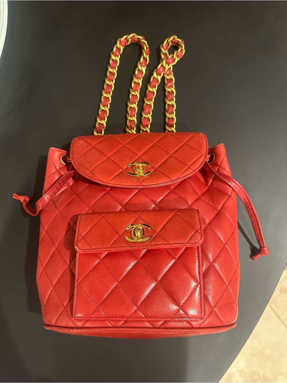 CHANEL Red Quilted Leather Backpack with Gold Hardware